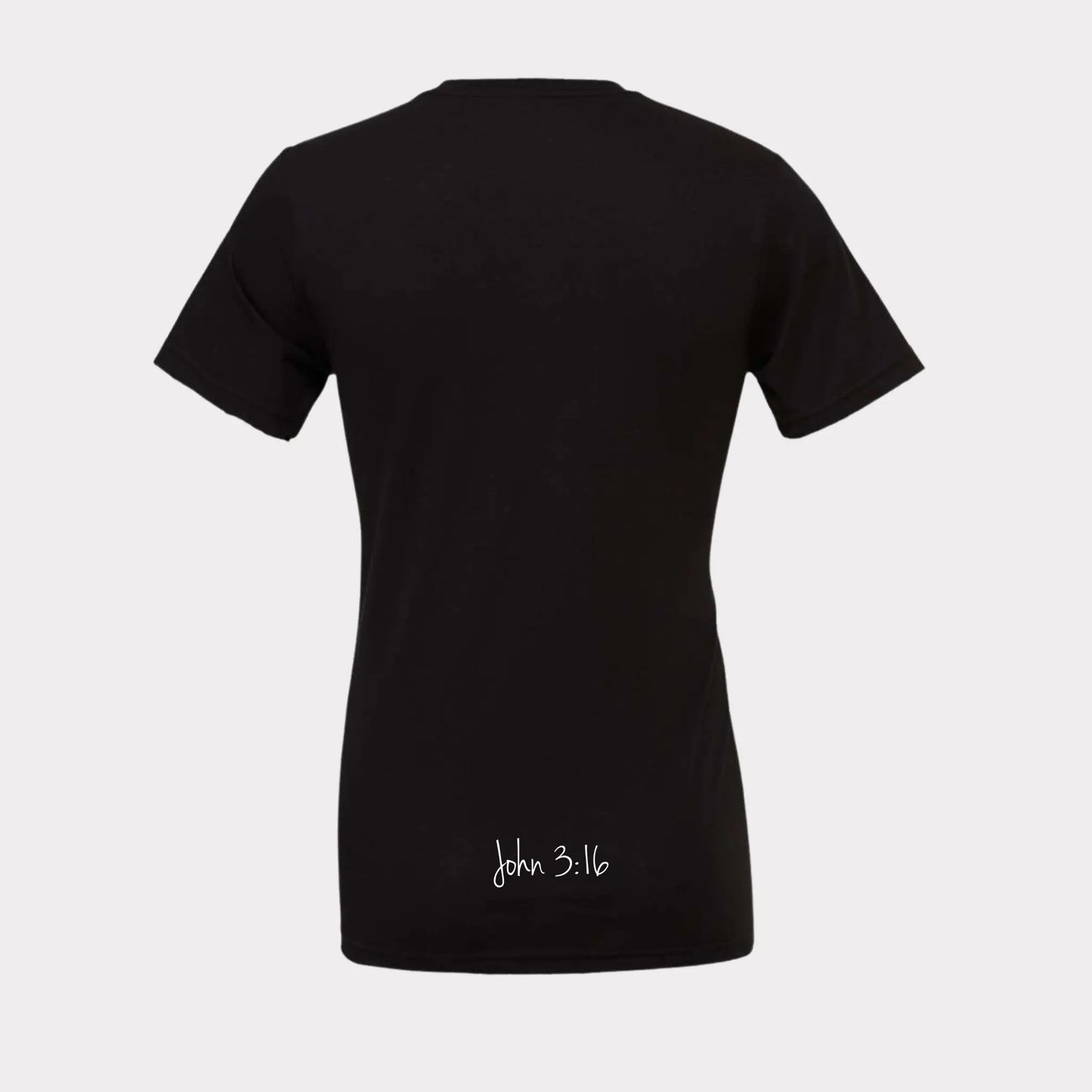 This T-shirt is all black with a crew neck style. The words Believer are pressed on the shirt in bold white letters. The T-Shirt is written across the chest, stretching from shoulder to shoulder. The T-shirt this comfortable and fitted. Size up for an oversized look. On a Neutral Colored background. The back reads John 3:16 on the tail of the T-Shirt. 