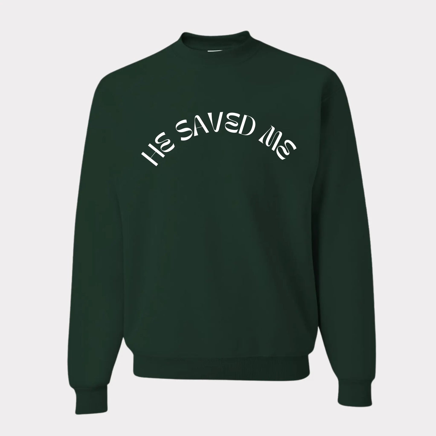 Forest Green premium crew neck sweatshirt. This sweatshirt reads "He Saved Me'" on the front  in white letters. The fit is comfy and thick. From Crown of Favor Forrest Green He saved me sweatshirt crewneck. He Saved Me sweatshirt. Christian clothing brand