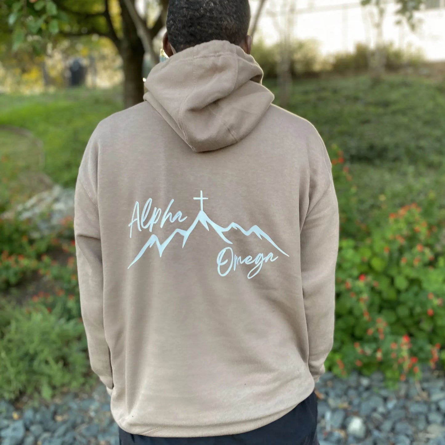 Alpha and Omega Tan  Hoodie. Alpha and Omega written in bold white letters on the front of the Tan Heavyweight hoodie. Tan Hoodie, christian clothing, faith based apparel Righteous sweatshirt. Jesus inspired clothing. Oversized sweatshirt. loungewear. streetwear. Christian streetwear. Christian clothing brand alpha and omega 