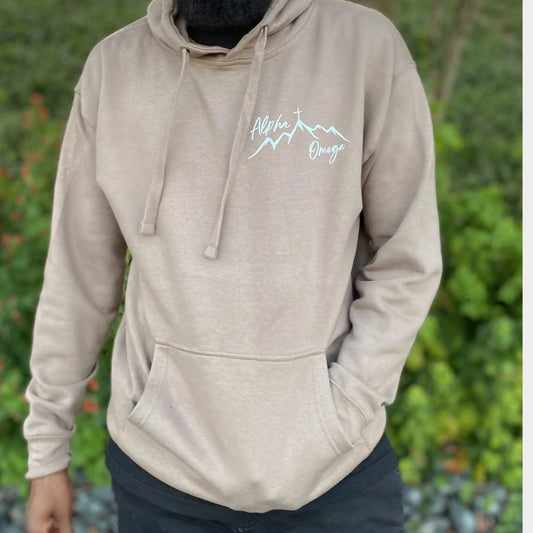 Alpha and Omega Tan  Hoodie. Alpha and Omega written in bold white letters on the front of the Tan Heavyweight hoodie. Tan Hoodie, christian clothing, faith based apparel Righteous sweatshirt. Jesus inspired clothing. Oversized sweatshirt. loungewear. streetwear. Christian streetwear. Christian clothing brand alpha and omega